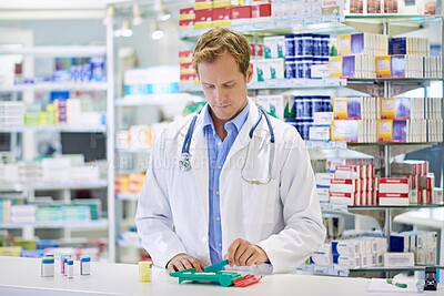 Buy stock photo Pharmacist, check and pills for prescription in pharmaceutical company for healthcare and wellness. Male doctor, medication and packaging drugs or tablet in clinic for help, trust and retail service