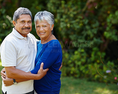 Buy stock photo Hug, bonding and smile with portrait of old couple in nature for romance, love or support. Peace, happiness and trust with senior man and woman in park for retirement, loyalty and commitment on space