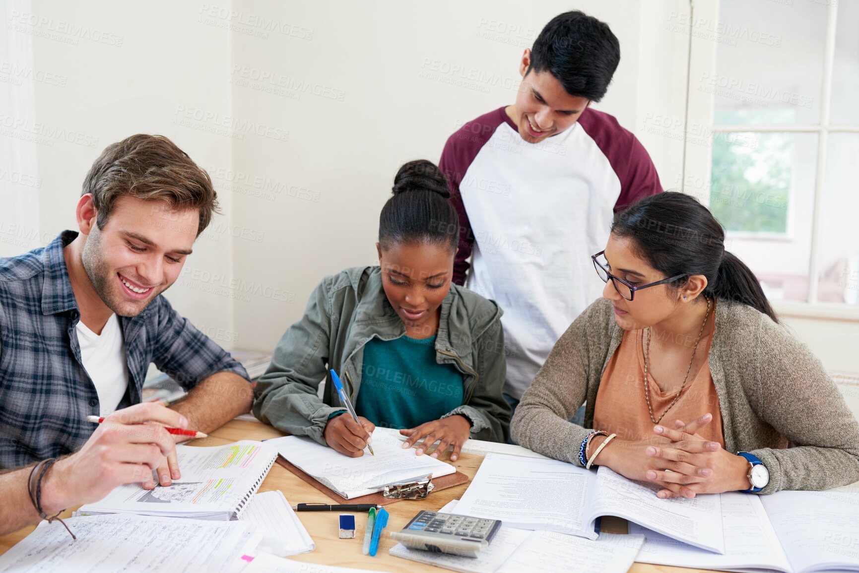 Buy stock photo Team, students and writing notes in university for learning, knowledge or brainstorming together. College, friends and happy people studying for information, education and help for math exam in class