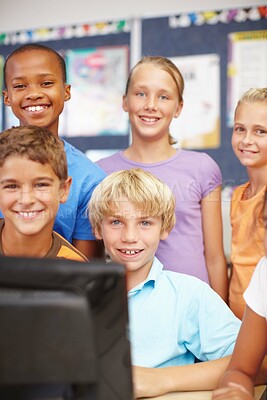 Buy stock photo Education, students and portrait at computer in classroom for online reading, elearning platform or scholarship. Children, smile and studying on tech at school for knowledge development or group quiz