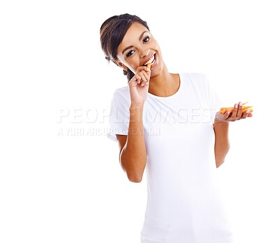 Buy stock photo Young woman, health and eating carrot for nutrition, wellness and balanced diet isolated in studio. Female person or model and with smile for fruit tshirt, vegan awareness and pride with organic food