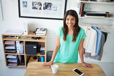 Buy stock photo Portrait, woman and fashion designer in workshop with pride as stylist in atelier or smile as entrepreneur. Female person, tailor and happiness with clothes for online, small business and creativity