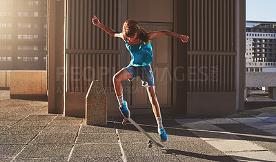 Buy stock photo Skateboard, city and woman with trick in air for jump stunt, practice and energy in New York. Girl, skater and female person with ollie flip on concrete for outdoor talent, skill competition or hobby