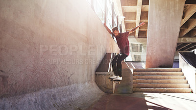 Buy stock photo Fitness, skateboard and rail with man at park for urban, extreme sports and trick flips. Street league, balance and culture with person and skating for grind in city with youth, energy and hobby