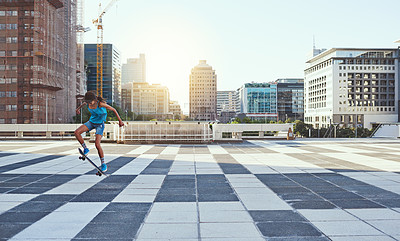 Buy stock photo Skating, fitness and woman in city, energy and training with urban town, recreation and hobby. Skateboard, outdoor and person with skills, technique and practice with exercise, balance and healthy