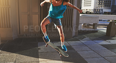 Buy stock photo Skateboard, city and woman with flip in air for jump stunt, practice and energy in New York. Girl, skater and female person with ollie trick on concrete for outdoor talent, skill competition or hobby