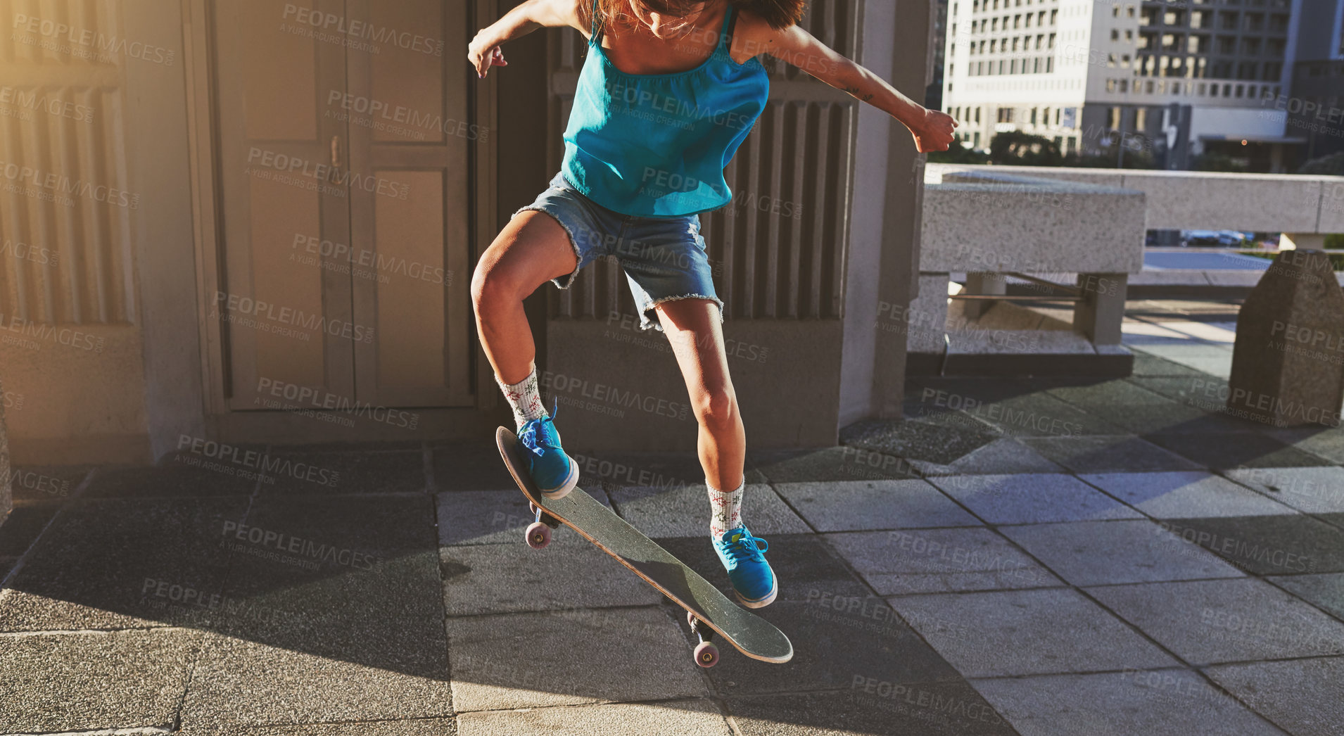 Buy stock photo Skateboard, city and woman with flip in air for jump stunt, practice and energy in New York. Girl, skater and female person with ollie trick on concrete for outdoor talent, skill competition or hobby