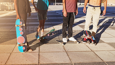 Buy stock photo Training, legs and group with skateboard, sports and practice for competition on road, edgy and outdoor. Fitness, together and people with equipment for game, urban and athlete with hobby on street