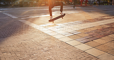 Buy stock photo Man, skateboard and city legs for trick, street sports and alternative transport in town. Challenge, feet and person for urban adventure on weekend, practice kickflip and outdoor training for stunt