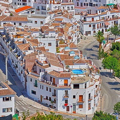 Buy stock photo Panoramic, urban view and city with architecture, skyline and coastal town in Spain with houses and street. Development, holiday and vacation destination in Europe with village and travel on trip