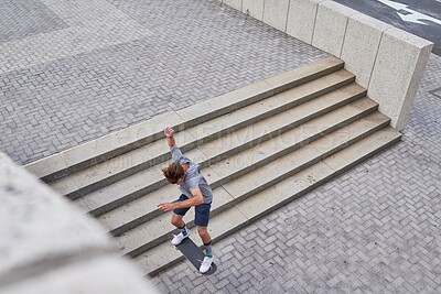 Buy stock photo Active, jump and man with skateboard, stairs and skills for street skating, trick and stunt for game. Outdoor, skateboarder and person with energy for competition, city and top view of extreme sport