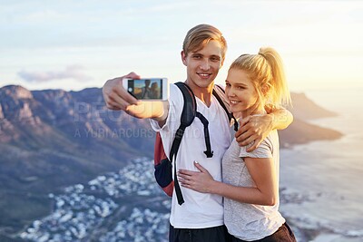 Buy stock photo Couple, hiking and selfie on mountain with smile for adventure blog, update or online post together. Man, woman and happy with digital photography in nature for fitness, travel memory or social media