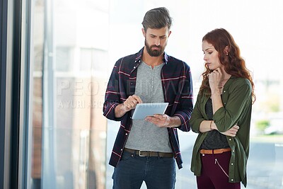 Buy stock photo Man, woman and tablet in office for startup company, research and graphic design for brainstorming. Business meeting, email and professional people in creative agency for digital team discussion