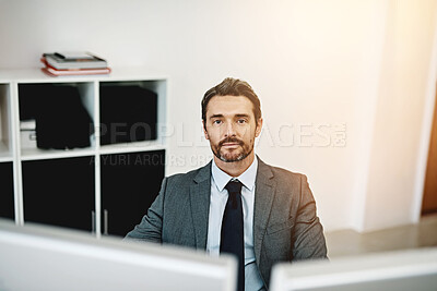 Buy stock photo Business man, computer and portrait in office for information technology, software or programming at startup company. Face of programmer or web developer at his desktop for online security on system