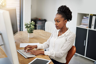 Buy stock photo Business woman, computer and reading in office for information technology, software or online programming. African programmer or web developer typing on her desktop for planning, solution or research