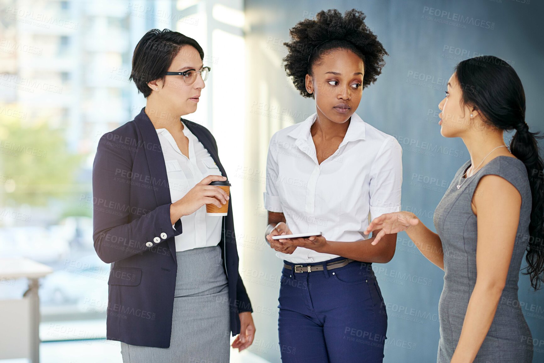 Buy stock photo Employee, women and conversation at office for meeting with teamwork or collaboration on project. Diversity, discussion and chat in startup company for creativity with report, feedback and share idea