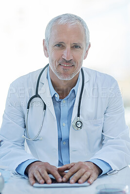 Buy stock photo Doctor, mature and portrait with tablet for hospital consulting with stethoscope, cardiology or research. Male person, face and desk for future telehealth or online connection, life insurance or app