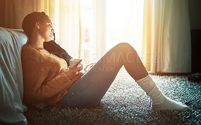 Buy stock photo Coffee, thinking and woman in bedroom for relax, calm and wellness beverage for energy or morning routine. Tea cup, home and female person with peace, inspiration and planning weekend on carpet floor