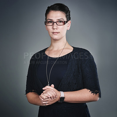 Buy stock photo Business woman, portrait and serious with glasses in studio for creative career or opportunity on a gray background. Female person, model or designer with spectacles or confidence for job or startup