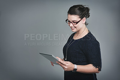 Buy stock photo Business woman, tablet and contact in studio, happy and notification with mock up space by background. Person, digital touchscreen and smile for deal, application and scroll for networking on web