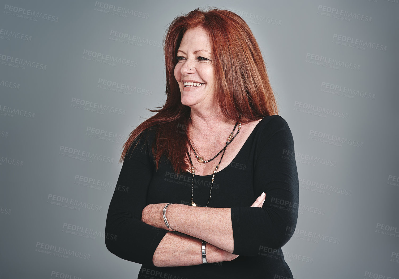 Buy stock photo Vision, arms crossed and happy business woman in studio for problem solving, planning or professional insight. Thinking, confidence and creative manager or mature editor in chief on gray background