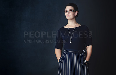 Buy stock photo Thinking, business and woman with fashion in studio, professional clothes and creative career. Confident, female person and mockup space with glasses of stylish outfit, management and dark background