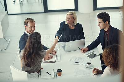 Buy stock photo Above, handshake and business people in office, review and partnership for project. Employees, shaking hands and group with b2b deal, gesture or collaboration with teamwork feedback or onboarding