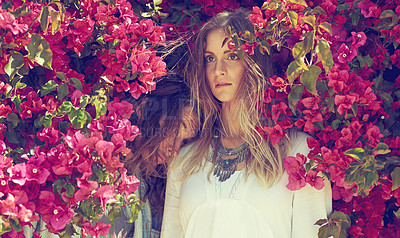 Buy stock photo Couple, relax and pink flowers outdoor for nature aesthetic, sustainable beauty and casual clothes. Thinking, people and  bohemian for fashion bloom, floral plants and summer season of stylish outfit