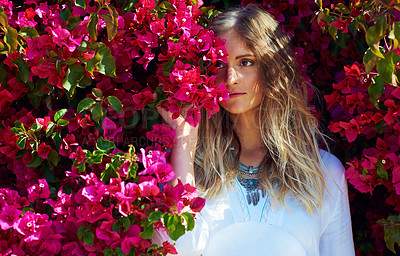 Buy stock photo Woman, thinking and nature flowers for fashion with aesthetic, sustainable beauty and casual clothes. Female person, jewellery and ideas with pink plants of summer season, stylish outfit and blooming