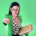 Angry, pointing and books with portrait of woman and teaching for study, learning and education. Mad, wrong and problem with annoyed teacher in green background studio for strict, failure and wrong 