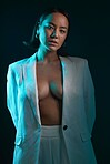 Dark, portrait and fashion with a woman on a studio background for a luxury aesthetic. Creative, young and an Asian model or sexy girl with a suit or vintage and isolated on a black backdrop