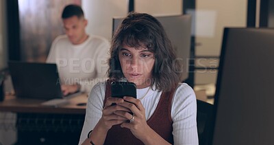 Buy stock photo Phone, typing and business woman in office at night, reading email and research on deadline. Smartphone, creative and serious professional designer on internet, website and communication in startup