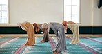 Islamic prayer, bow and women in mosque for Palestine, gratitude and support to Allah on holy carpet. Kneeling, community or Muslim people worship God for faith and Dua on Ramadan Kareem together