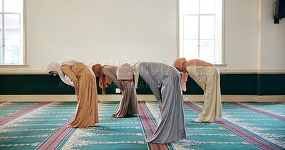 Buy stock photo Islamic prayer, bow and women in mosque for Palestine, gratitude and support to Allah on holy carpet. Kneeling, community or Muslim people worship God for faith and Dua on Ramadan Kareem together