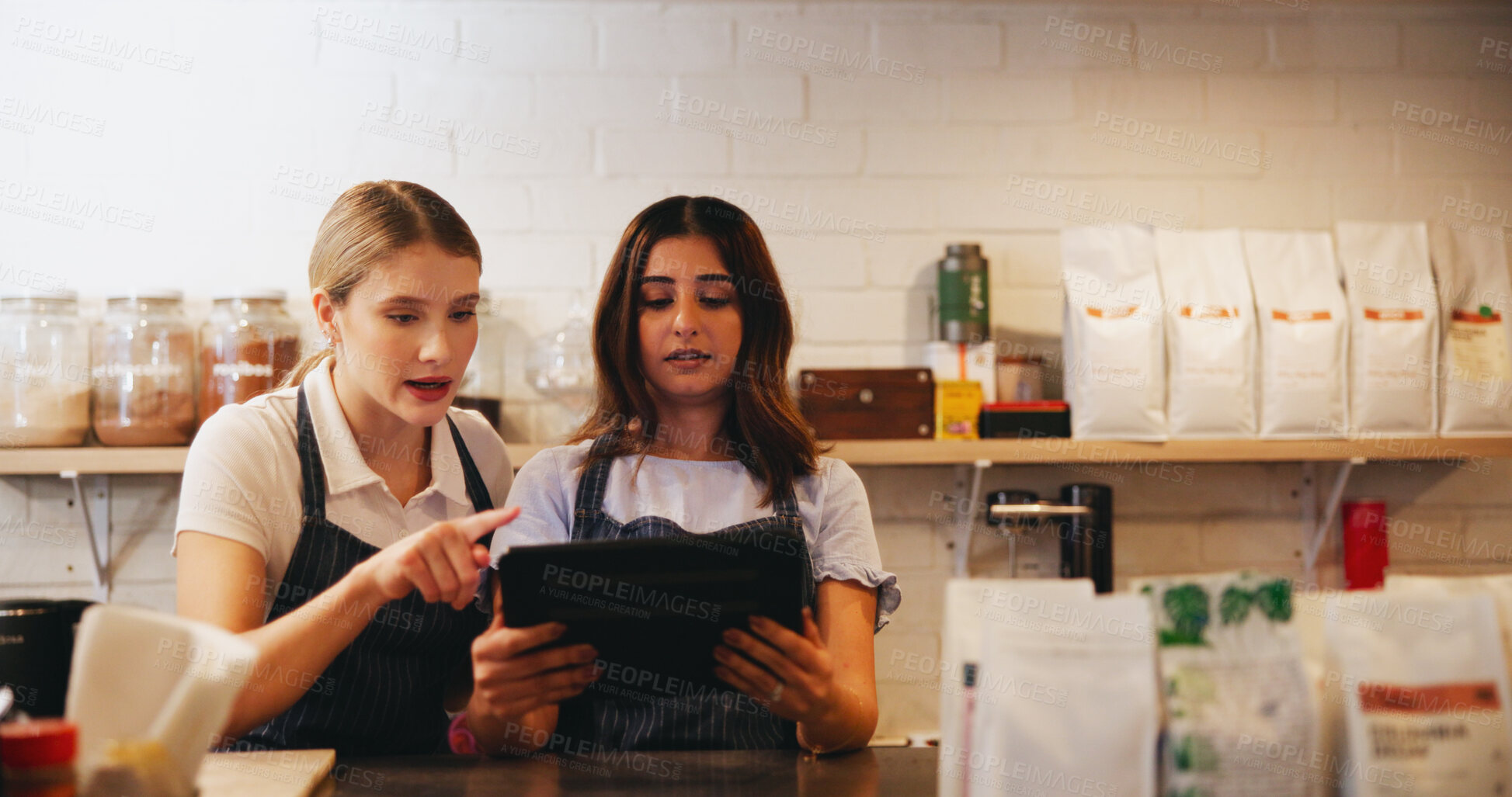 Buy stock photo Cafe, barista and manager with tablet for restaurant management, orders or customer service reviews. Women, waiter and business owner with digital technology for coffee shop, startup or ecommerce