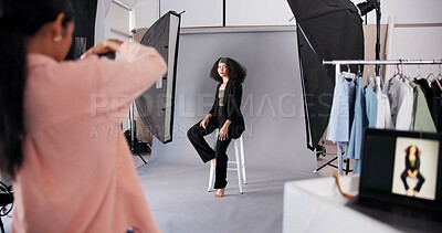 Buy stock photo Production, woman and studio photographer with model for magazine photoshoot, media or picture. Camera pose, professional photography and fashion on set, creative process and designer advertising