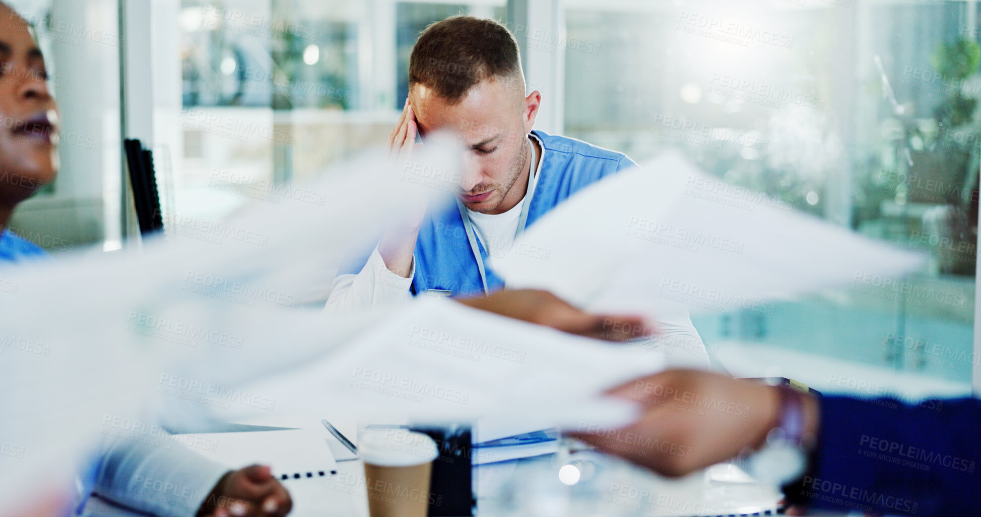 Buy stock photo Frustrated man, nurse and documents with headache for pressure, overworked stress or anxiety at busy hospital. Male person, doctor or healthcare worker with migraine, paperwork or chaos at clinic