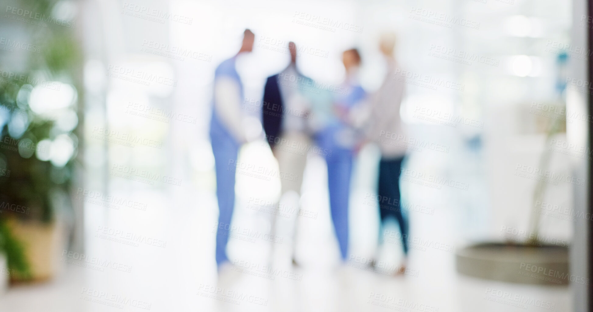 Buy stock photo Blur, doctors and people in hospital, lobby and with medical insurance, teamwork and conversation. Group, employees and professional in hallway, healthcare and decision with choice and cooperation