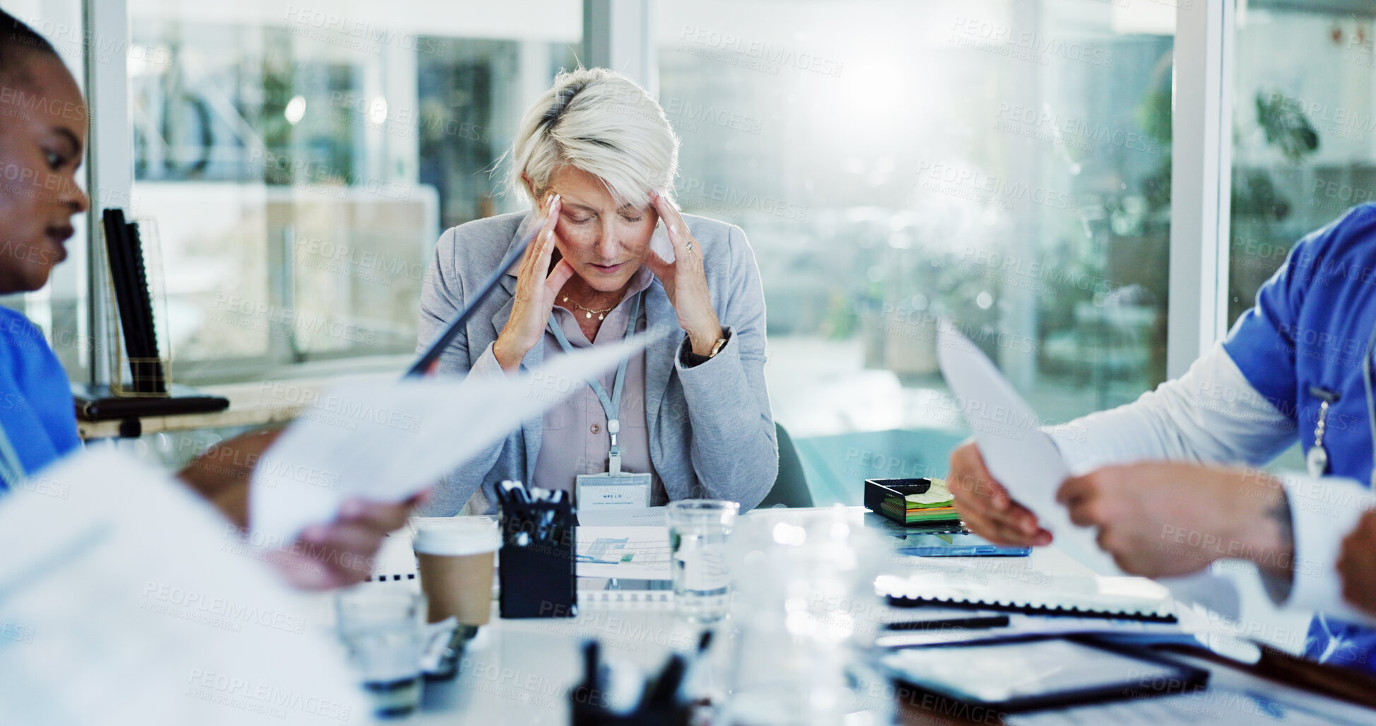 Buy stock photo Frustrated woman, headache and doctor with documents for overworked stress or anxiety at hospital. Female person, investor or fatigue with migraine for chaos, bad medical funding or clinic deadline