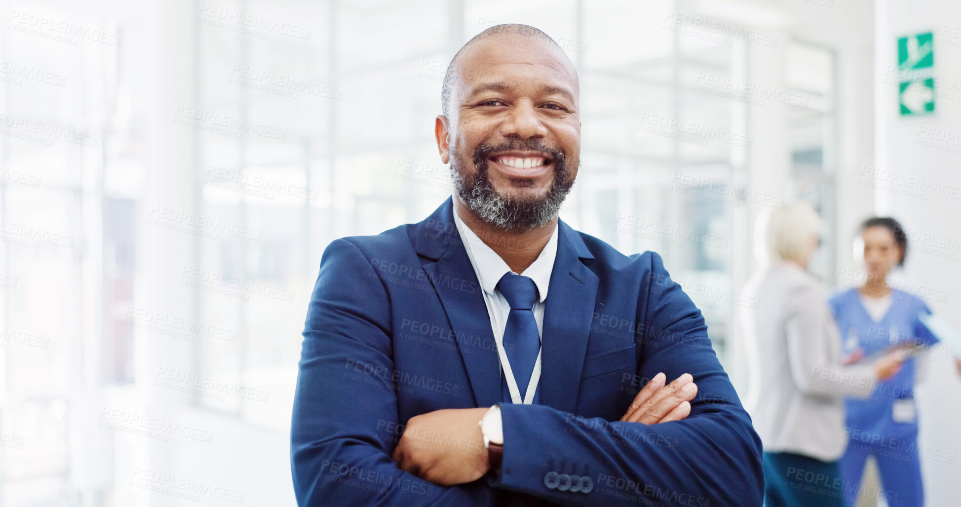 Buy stock photo Portrait, business and man in hospital, arms crossed and confidence with accountant, bookkeeper and smile. Face, person and employee in clinic, research fellowship and senior surgeon in hallway