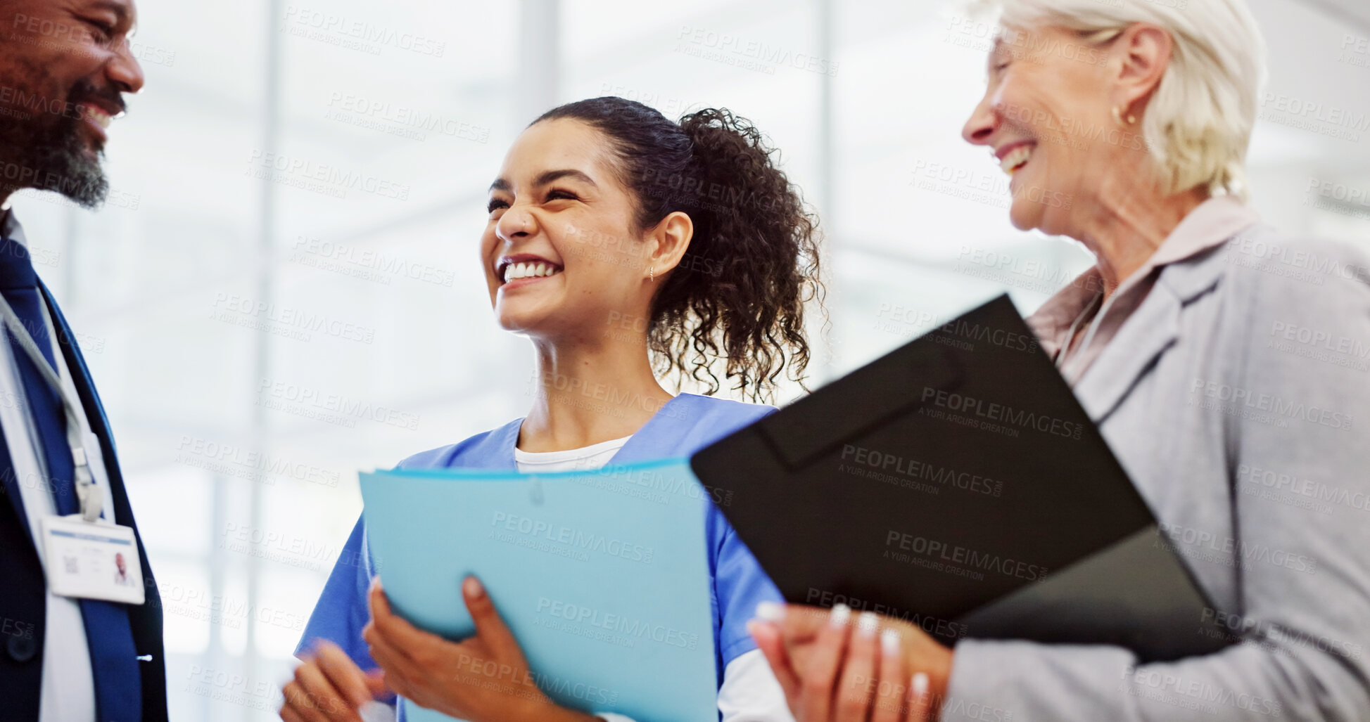 Buy stock photo Doctors, discussion and documents at hospital in hallway for breakthrough, progress or solution for medical crisis. Clinic director, man and woman with nurse, surgeon or diversity for health services