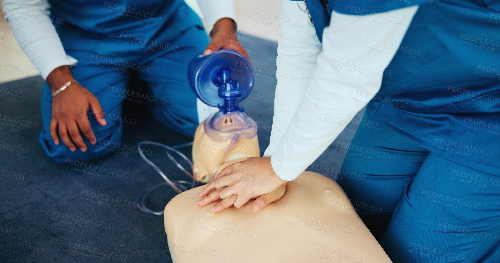 Buy stock photo Mask, hands or students learning cpr on mannequin for first aid, cardiac arrest or healthcare protocol. Medical class, nurses or people with respiratory tool in paramedic course or nursing school 
