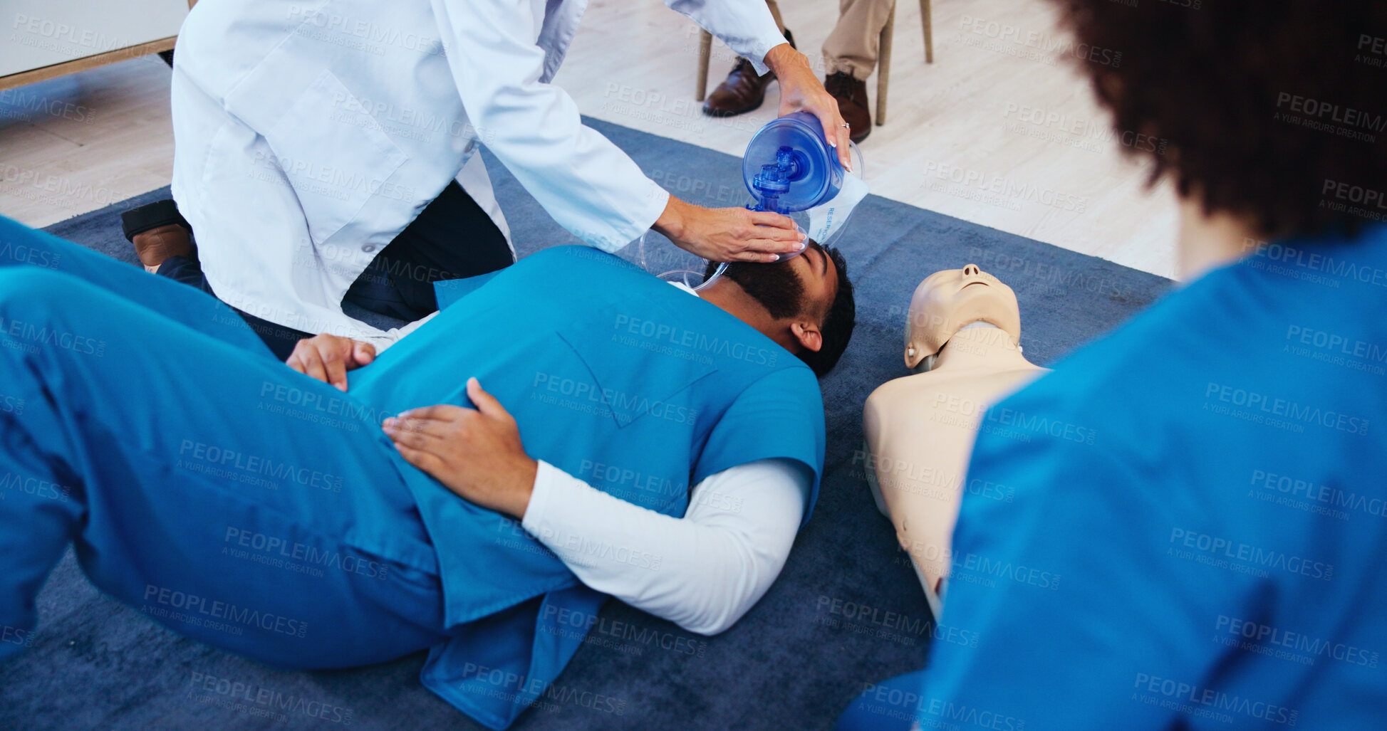 Buy stock photo Mask, hands or students with doctor for learning cpr on volunteer for first aid help or healthcare protocol. Medical class, nurses or people with breathe or respiratory tool in paramedic or nursing