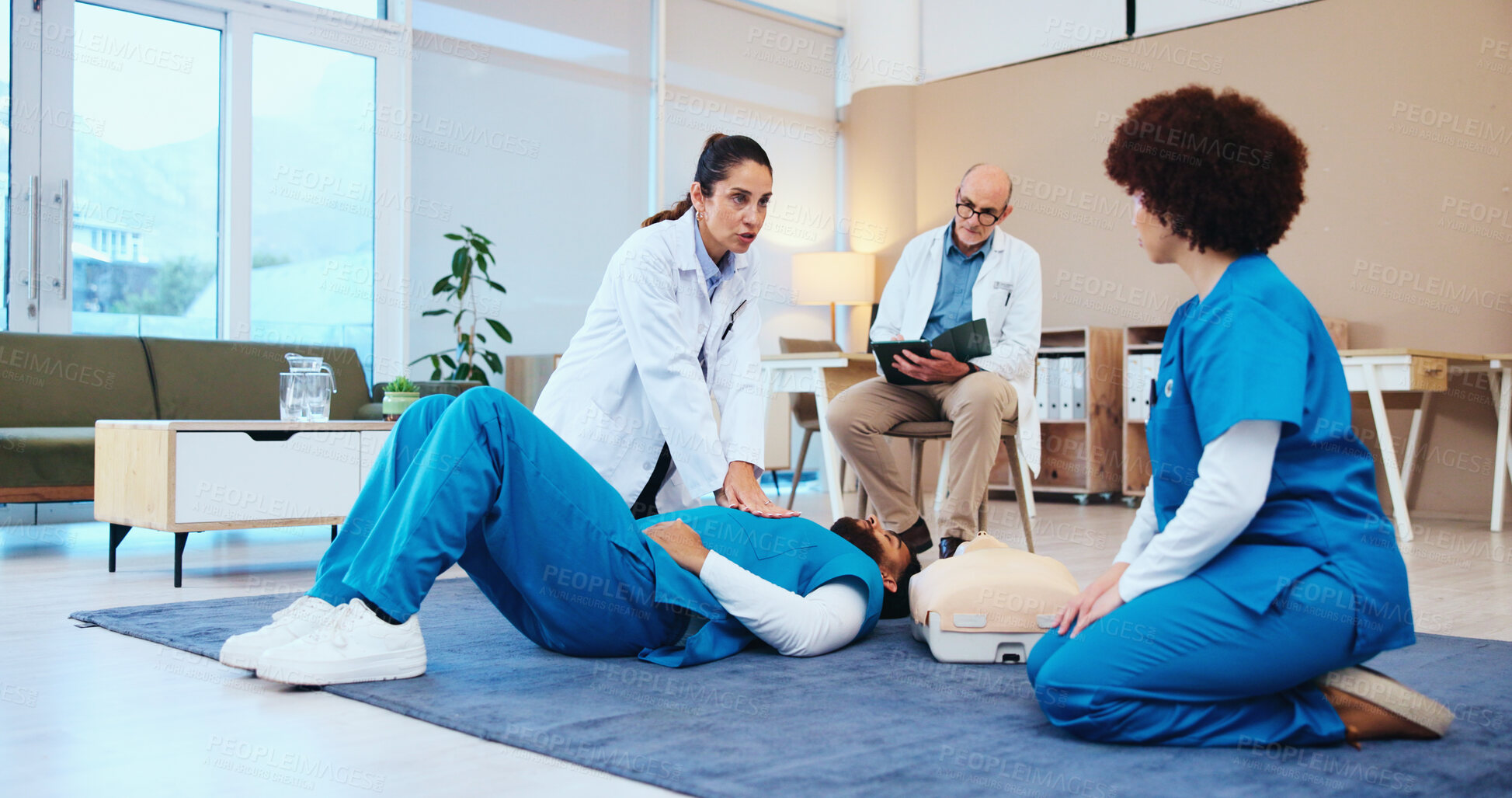 Buy stock photo Nurse, cpr or people training with doctor for first aid practice, cardiac arrest or safety protocol. Healthcare class, medical simulation or heart attack rescue in paramedic course or nursing school