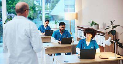 Buy stock photo Healthcare, students and doctors with test, studying or knowledge of diseases, listening and classroom. Education, learning and people with info for medicine, laptop or skills for license in hospital