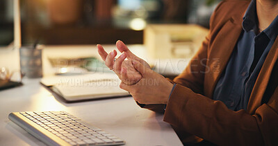 Buy stock photo Night, woman and hands in office with joint pain, overworked muscle and carpal tunnel syndrome. Employee, wrist injury and tension in workplace with burnout, deadline pressure and massage at tech