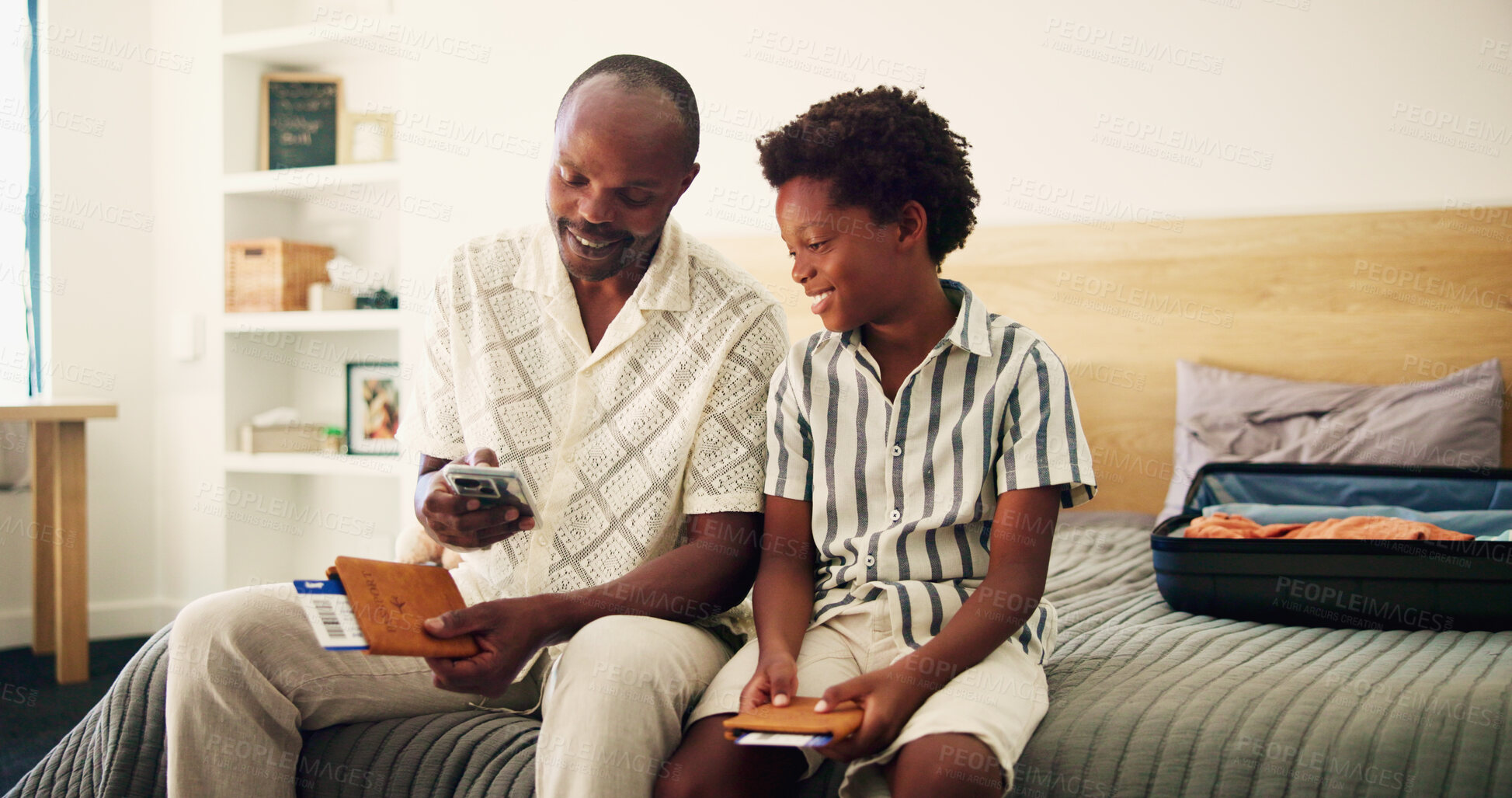 Buy stock photo Phone, passport and family with smile for ticket, online booking and checking flight for travel. Home, black people and father with mobile for checkin app, boarding pass and boy for vacation holiday