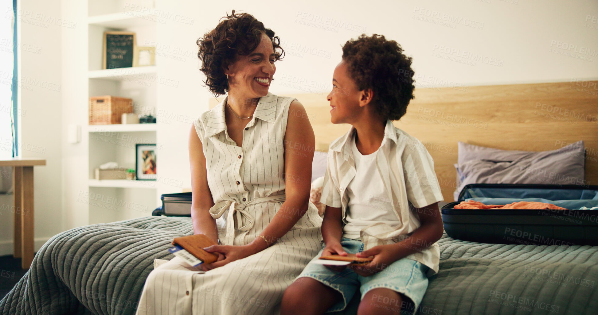 Buy stock photo Happy, suitcase and mom with child in bedroom with clothes for adventure, holiday and vacation. Black family, home and mother with boy help packing in luggage prepare for trip, travel and journey