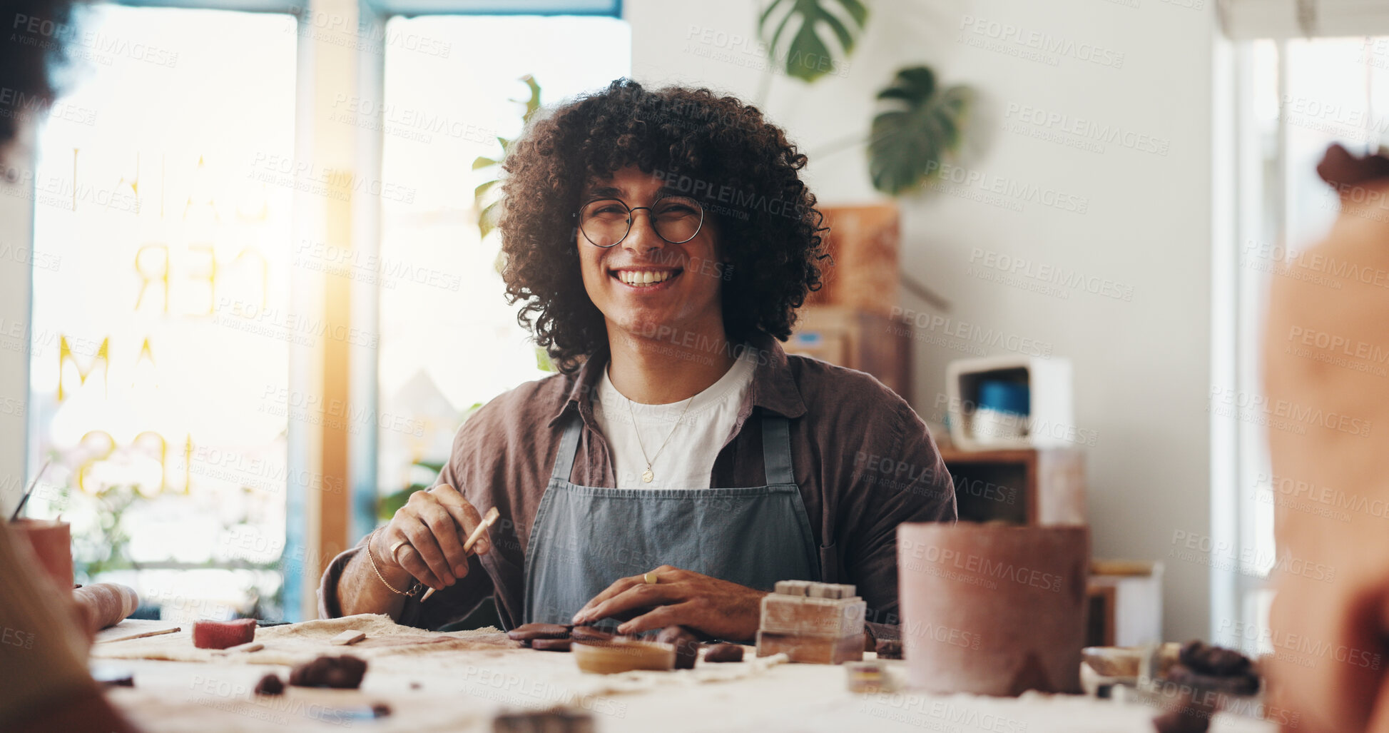 Buy stock photo Man, portrait and pottery in clay studio, workshop and art process for handmade ceramic design. Craft, hobby and happy artist with fun, artwork and smile in creative class for sculpture learning