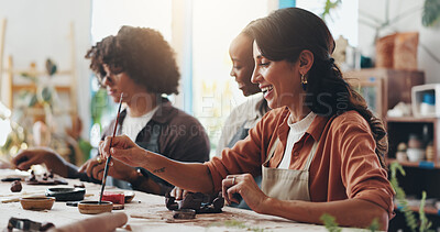 Buy stock photo Woman, pottery class and friends in clay studio, workshop and art process for handmade ceramic design. Craft, hobby and happy artist with fun, artwork and smile for creative sculpture learning